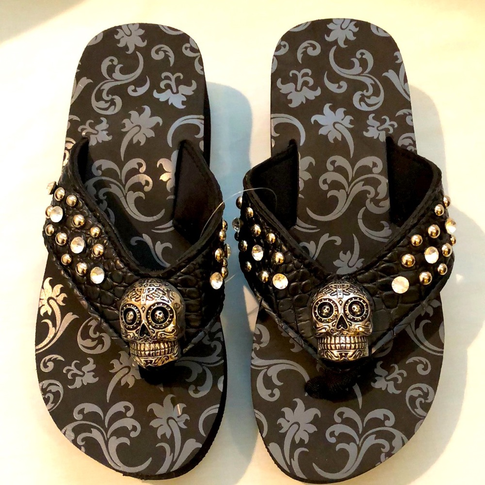 Skull headed flip flops
